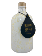 Tall, white ceramic container, speckled with yellow paint, containing Golden Nectar, Organic, Extra Virgin, Olive Oil