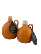 Round, orange, painted ceramic containers containing Golden Nectar, Organic, Extra Virgin, Olive Oil